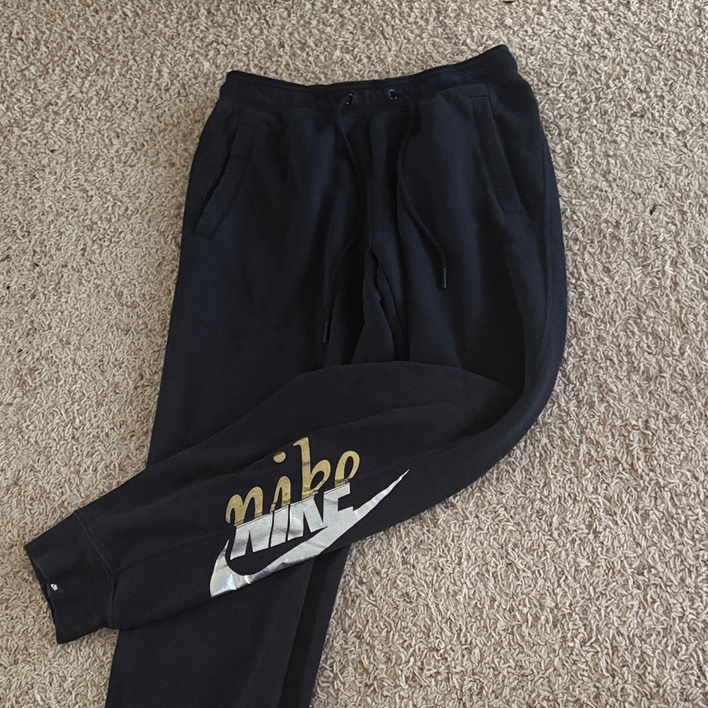 Nike Black Joggers with Gold and Silver Logo